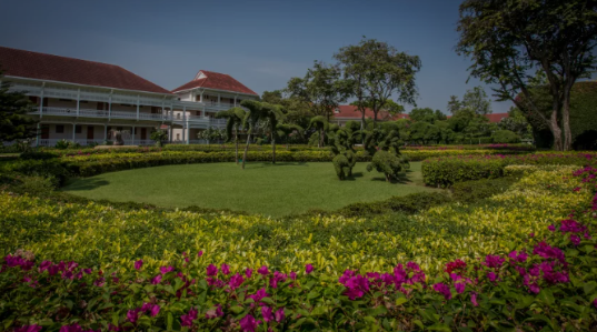 Centara Hotels & Resorts colourful scene with a hotel at the back