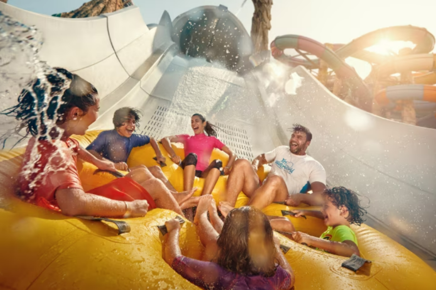 A family of 6 enjoying their time during an trip they booked through Yas Waterworld. To enjoy a special discount, don't forget to apply the amazing Yas Waterworld promo codes