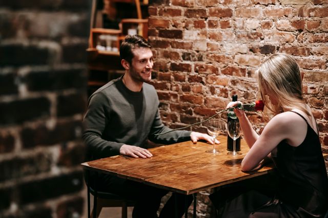A couple going on a first date after they saved on their membership with a Illicit Encounters voucher code