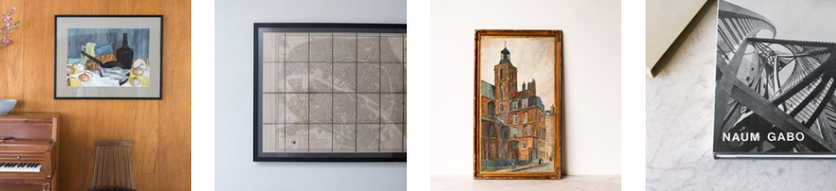 four framed wall art placed on the wall with white backgrounds and one having piano next to it