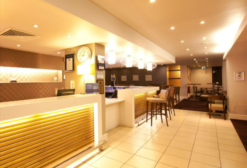 The hallway and and coffee bar of the Holiday Inn Express London Croydon which is an IHG Hotel