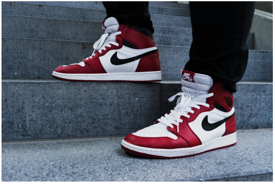 A person wearing a pair of Air Jordan sneakers