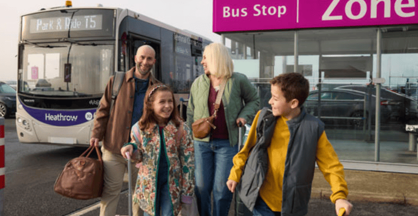 A family using the shuttle service to get form the parking bay to the airport terminal.