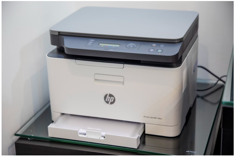 A white and gray printer you can purchase at 123 Ink Cartridges
