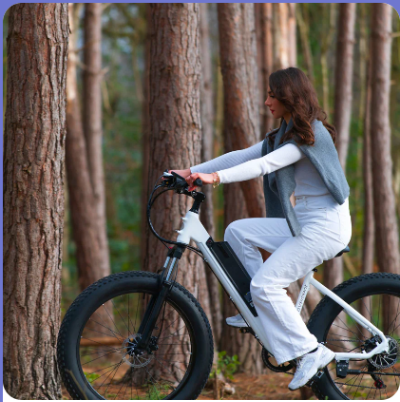 A woman cycling to work on an electric bike she bought with our e movement voucher codes
