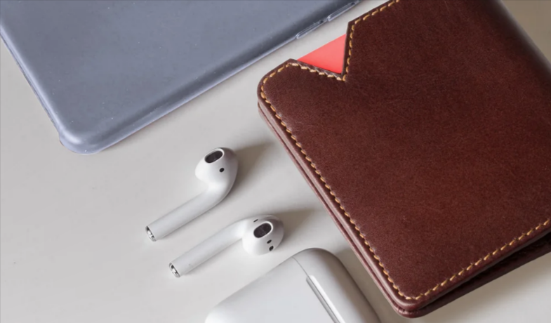 A A-SLIM RFID wallet and earbuds