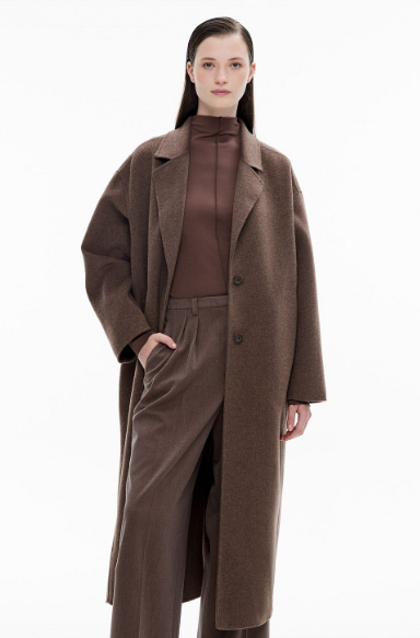Women's coats and jackets: A model wearing a mocha double faced coat