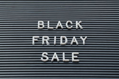 A black sign with the words "Black Friday Sale" written in white