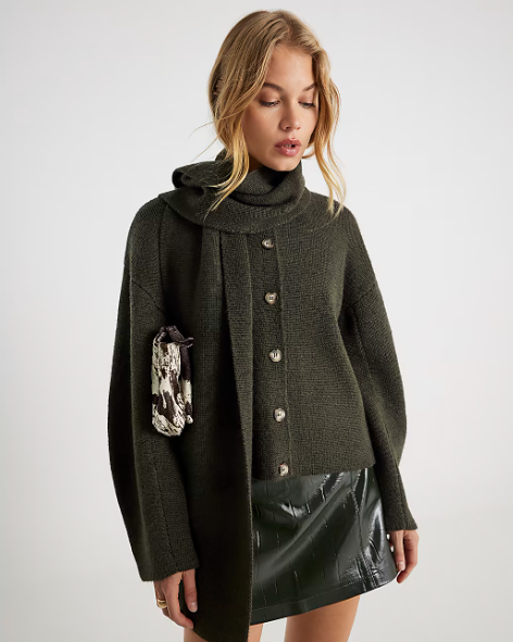 Cardigans for autumn: A model wearing the green knitted wrap scarf cardigan