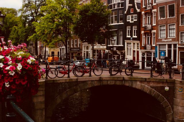 A bunch of I amsterdam rental bicycles on a bridge in Amsterdam that people saved on renting with a I amsterdam voucher code