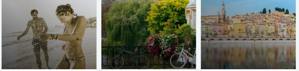 a couple enjoying a beach, bicycles by a flower-filled riverside, and a colourful European town reflected on calm water.