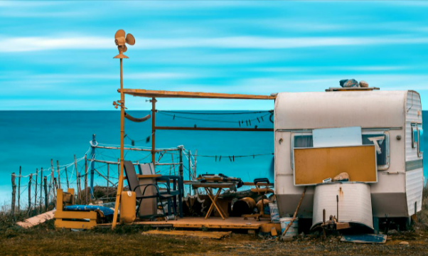 White and Brown Campervan on Beach Shore