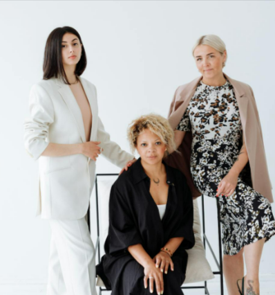 Stylish women posing together showing stylish pieces from the BSTN catalogue