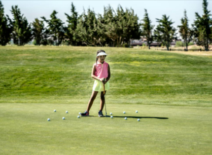 Ac girl holding golf club