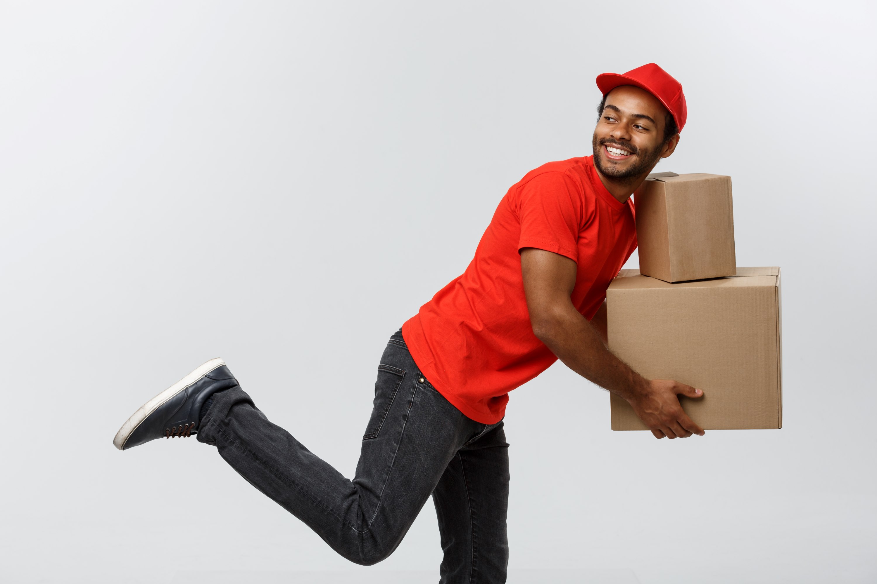 smiling man with delivery boxes