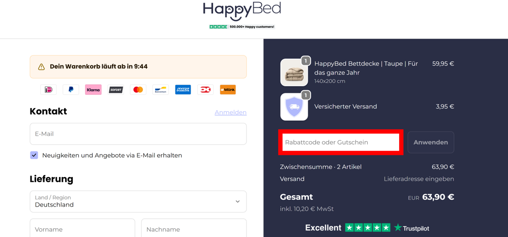 Checkout von HappyBed mit rotmarkiertem Eingabefeld für Gutscheine