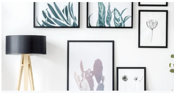 Custom made picture frames hung on the wall