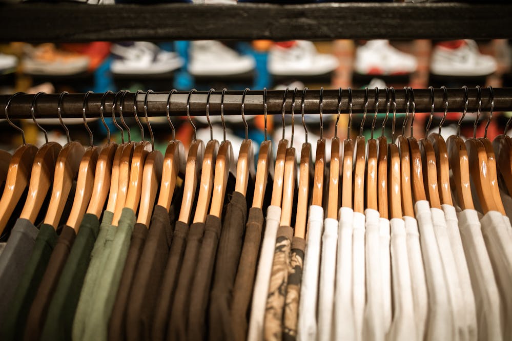 Online shopping deals for Black Friday: Shirts hanging from a clothing rack