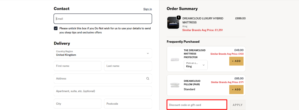 Applying a DreamCloud discount code at checkout to save on your order.