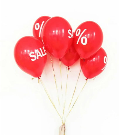 Red balloons on white background and January Sales sale signs