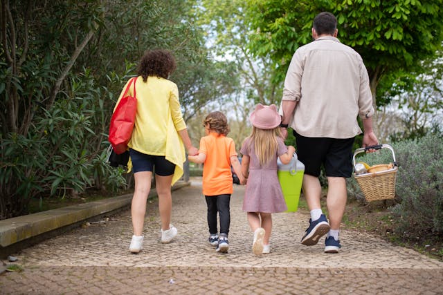 Activities for Father's Day: A family walking together in the park