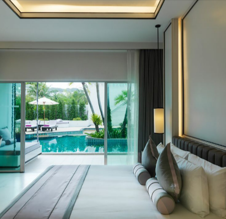 A room with access to a private pool in the Chanalai Romantica Resort