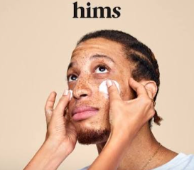 A man applying Hims’ product on his face