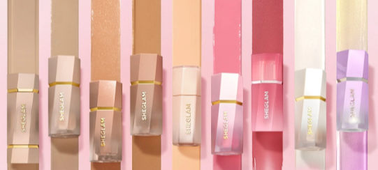 SHEGLAM makeup products displayed on pink, peach, beige, and purple background