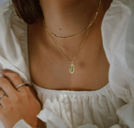 Crop stylish woman in wedding dress and jewellery pieces from CreationWatches