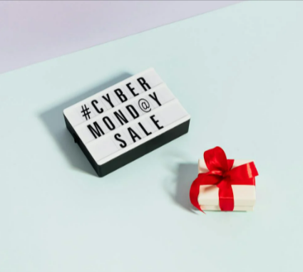 Cyber Monday sale sign and a gift box