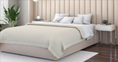 A bed from Aspire Store in a neutral tone room