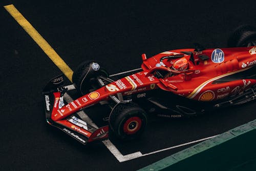 A Ferrai F1 car crossing the finish line