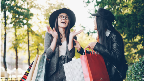 Women expressing their happiness after shopping with International Women's Day discount codes