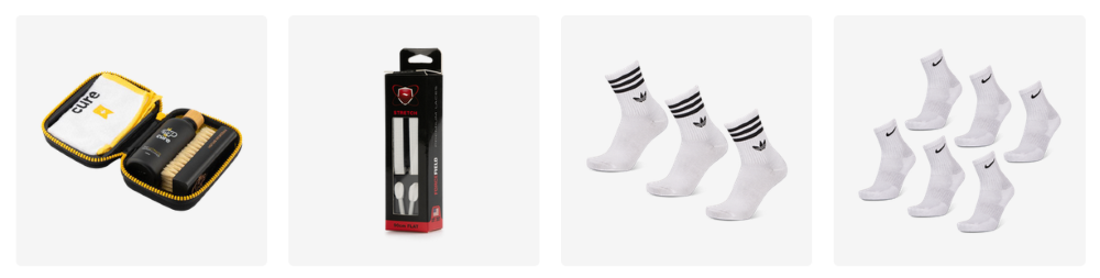 A Foot Locker shopping cart containing a Cure shoe care kit, shoe stretchers, Adidas crew socks, and Nike ankle socks on a light grey background.