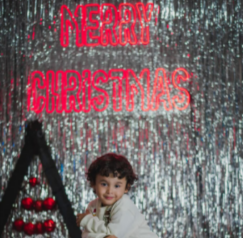 A Kate seasonal Christmas backdrop at a photoshoot