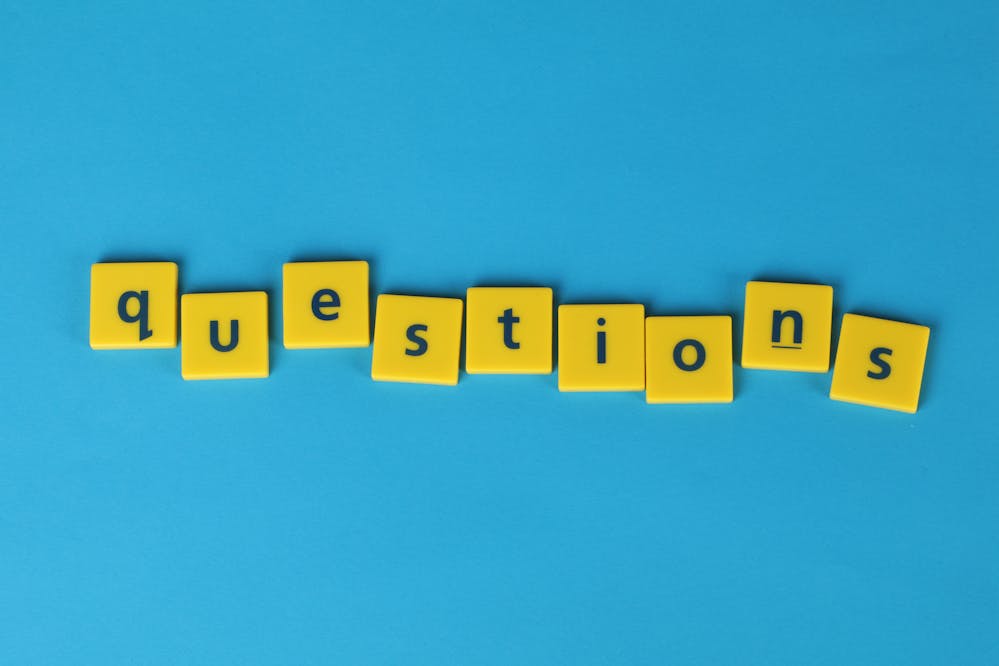 Best early Black Friday deals: Scrabble tiles spelling out the word 'questions'