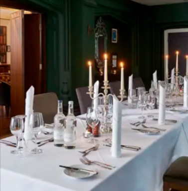 A dinner setup laid out in a Hotel Du Vin hotel