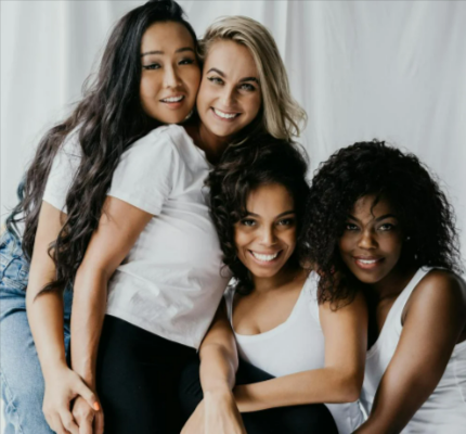 Beautiful women smiling at a photoshoot
