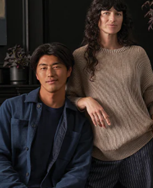 A man and woman wearing clothing items from Dockers