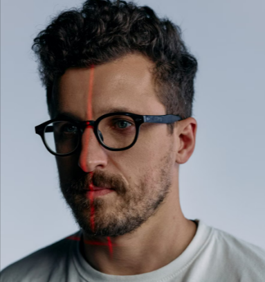 Man wearing HTC VIVE VR glasses on offer