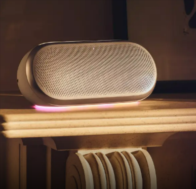 The Harman Kardon Luna 2 wireless bluetooth speaker in the colour warm sand