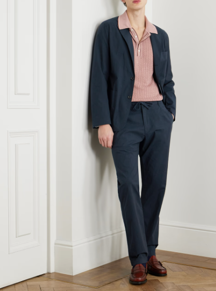 Wedding guest suits: A model wearing a drawstring cotton suit