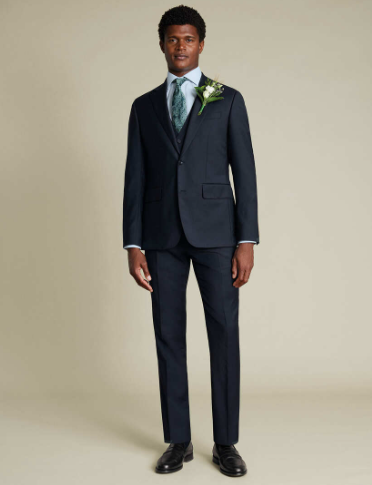A man wearing a slim fit suit bought with a Charles Tyrwhitt discount code