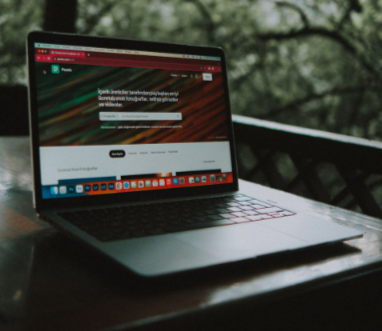 Open laptop showing a website created through a HostPapa plan.