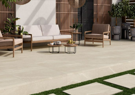 Gardenstone porcelain paving on a patio with outdoor garden chairs