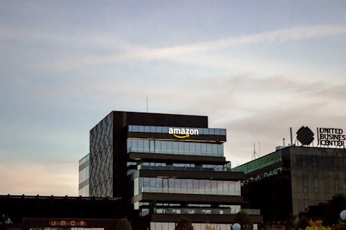 The Amazon HQ building against a sunset