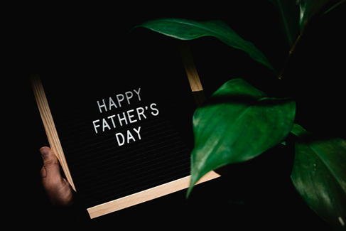 image showing a board which reads happy father's day