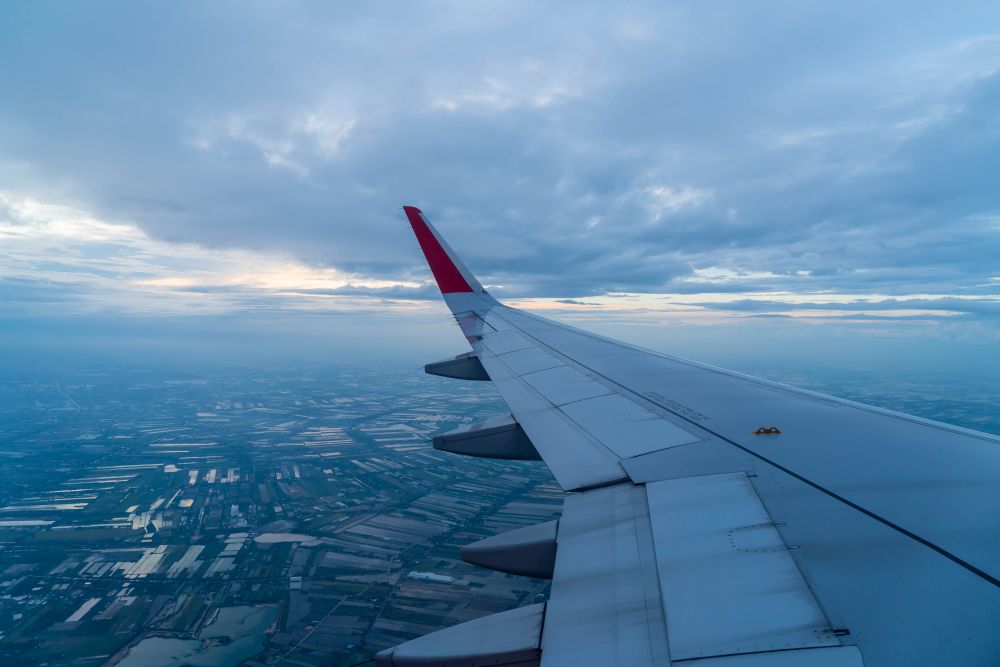 airplane-flying-clouds