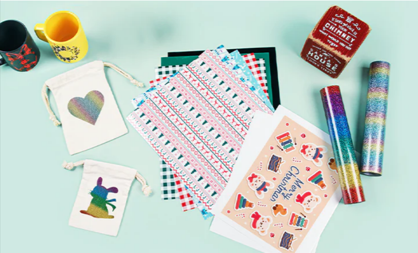The HTVRONT Christmas card-making kit with several Christmas-inspired prints