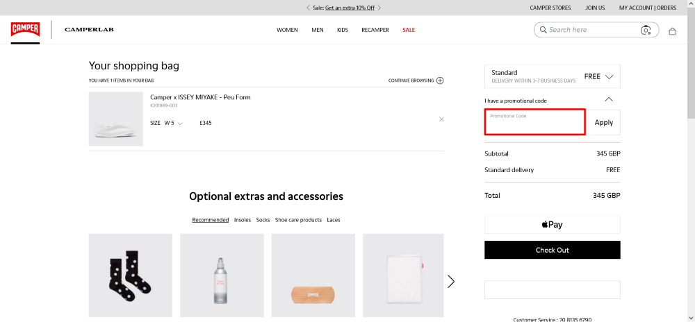 The Camper checkout page, where the code is pasted shown in a red box.